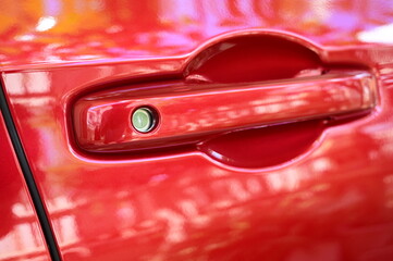 Wall Mural - door handle of red car, transpotation industry