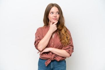 Young pretty woman isolated on white background thinking an idea while looking up