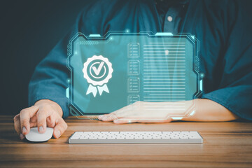 Businessman using a computer keyboard with sign of the top service quality assurance on virtual screen. Guarantee, Standards, ISO certification and standardization concept.