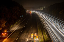 High Angle View Of Road Resurfacing Work At Night