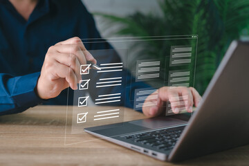 Electronic smart checklist and document on virtual screens concept, business people check electronic documents on digital documents, paperless offices,working on borderless communication technology