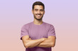 © Damir Khabirov - Indoor portrait of european caucasian man on purple background in t-shirt with crossed arms