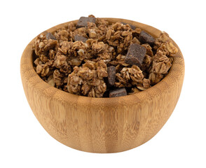 Wall Mural - Side angle view of a wood bowl filled with chocolate chunk granola isolated on a white background.