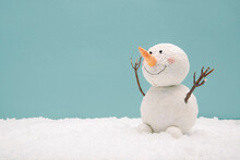 Funny Snowman On A Turquoise Background
