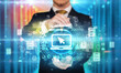 © ra2 studio - Businessman holding technology icon concept