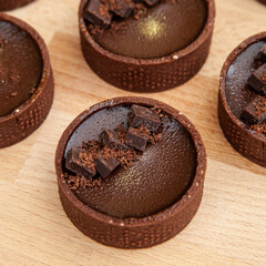 Wall Mural - Dark chocolate mini tart, dessert