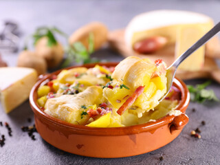 Wall Mural - french traditional tartiflette ( baked potatoes with bacon and cheese)