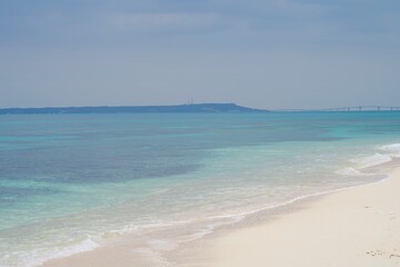 Wall Mural - The view of the clear ocean and Irabu Island from Nagamahama Beach