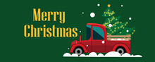 Creative Christmas Card With Red Car And Fir Tree On Green Background