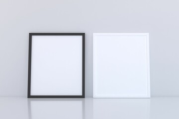 Wall Mural - 3D rendering of mockup frames near a white wall