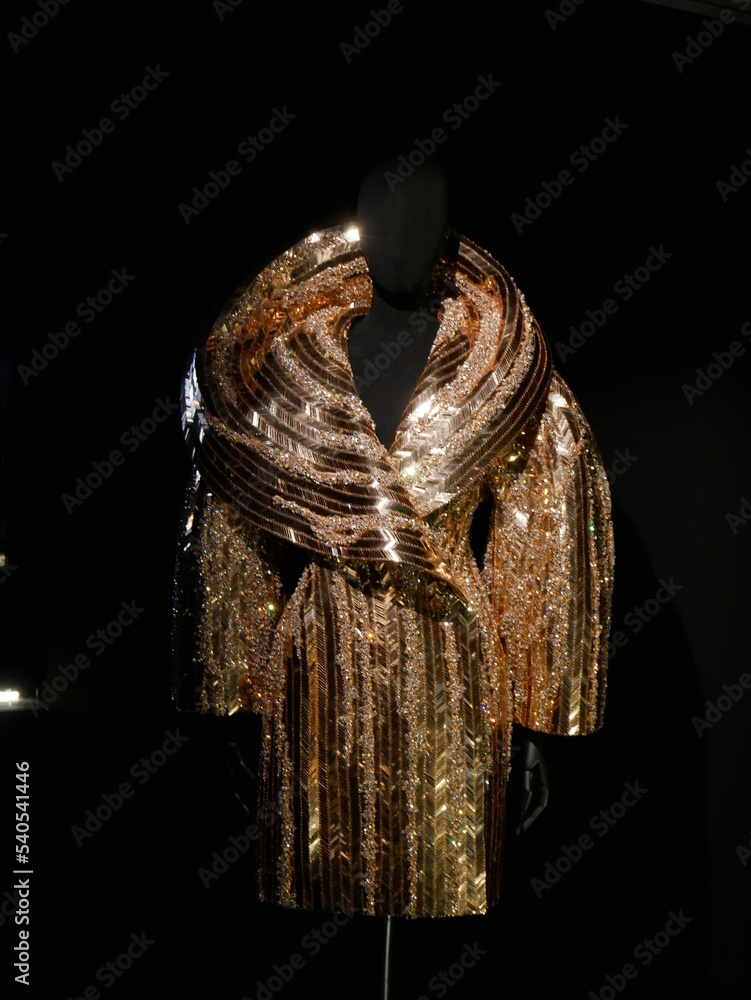 View of a haute couture dress by Elsa Schiaparelli, fashion designer who  inspired Yves Saint Laurent. Stock Photo | Adobe Stock