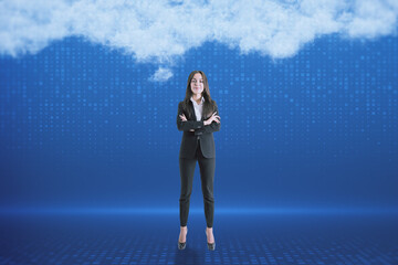 Canvas Print - Attractive young european businessman on blurry digital blue background with abstract cloud. Cloud computing, big data and digital transformation concept.