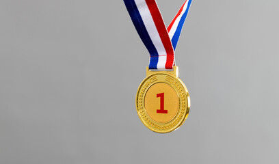 Wall Mural - Gold medal on gray background