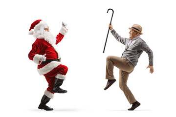 Wall Mural - Full length profile shot of happy Santa Claus dancing with an elderly gentleman