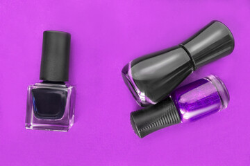 Poster - Nail polish on purple background