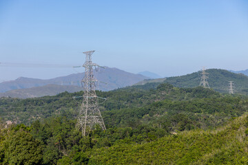 Canvas Print - High voltage powerline on the mountain