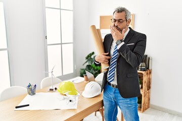 Sticker - Middle age hispanic business man holding paper blueprints bored yawning tired covering mouth with hand. restless and sleepiness.