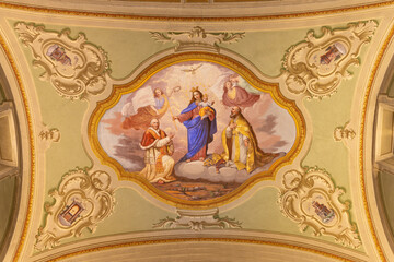 COURMAYEUR, ITALY - JULY 12, 2022: The ceiling fresco of Madonna among the saints in church in the church Sanctuary of Notre Dame de Guerison by Giuseppe Stornone (1816 - 1890).