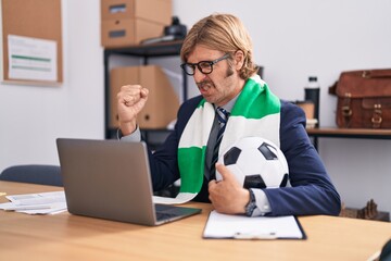 Canvas Print - Caucasian man with mustache working at the office supporting football team annoyed and frustrated shouting with anger, yelling crazy with anger and hand raised