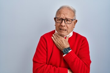 Sticker - Senior man with grey hair standing over isolated background shouting suffocate because painful strangle. health problem. asphyxiate and suicide concept.