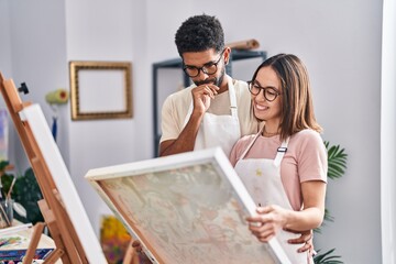 Poster - Man and woman artists smiling confident looking draw at art studio