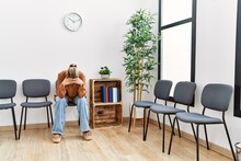 Young Blonde Woman Desperate With Hands On Head At Waiting Room