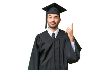 Wall Mural - Young university graduate man over isolated background pointing with the index finger a great idea