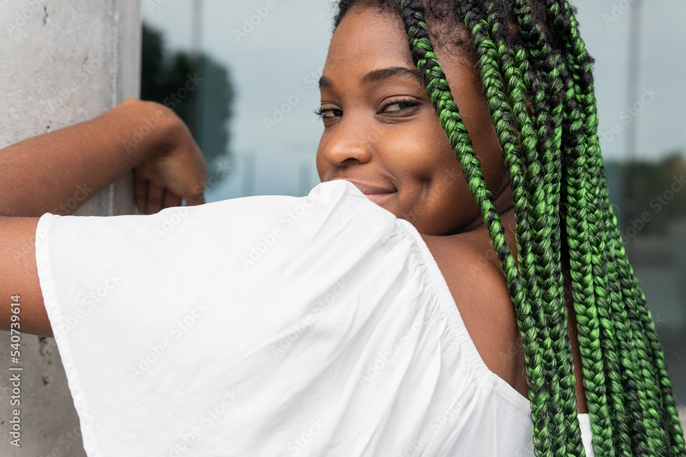 Cool young black female with long braids Stock Photo | Adobe Stock