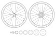 Two bicycle wheels and tires with rear wheel gear details.
