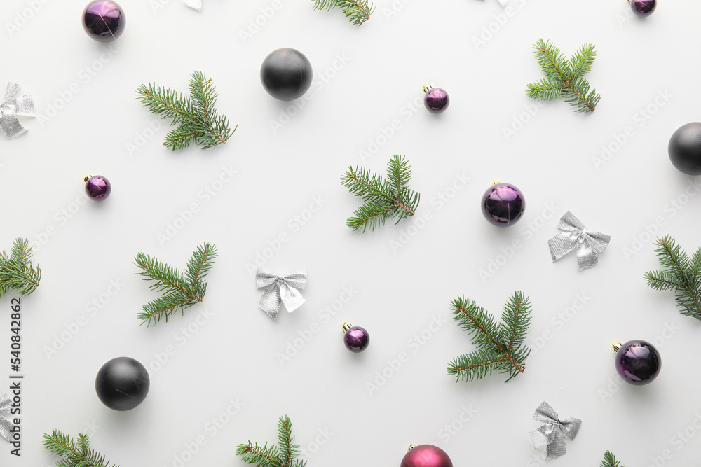 Fir branches and beautiful Christmas decorations on white background