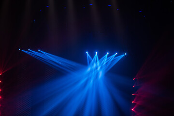 Wall Mural - colorful stage spotlights with laser radiation