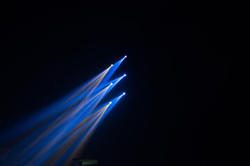 Wall Mural - colorful stage spotlights with laser radiation