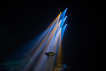 Wall Mural - colorful stage spotlights with laser radiation