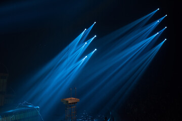 Wall Mural - colorful stage spotlights with laser radiation