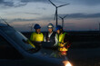 © EFStock - Technicians engineers working in wind turbine electricity plant at night. Renewable energy solution for climate change