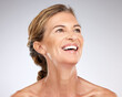 © Kirsten D/peopleimages.com - Skincare, beauty and face of happy senior woman thinking about dermatology, facial botox or cosmetics against mockup studio background. Face, antiaging and wellness of female with self love mindset