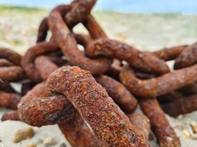 Old, Rusty Chains Left On The Beach, Close-up