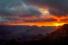 A View Of The Sun As It Begins To Peak Over Mather Point In The Grand Canyon