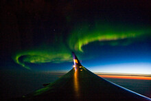 View Of The Northern Lights As Seen From An Airplane Flight Over The North Atlantic Ocean.