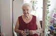 © Cavan Images - portrait of elderly lady in her home