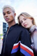 © Wesley J/peopleimages.com - Fashion, youth and portrait of couple in city pose for selfie wearing trendy, stylish and cool clothes. Diversity, freedom and fashion design students on weekend in urban town with serious face
