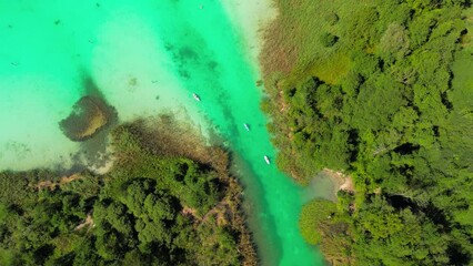 Wall Mural - Klagenfurt, Austria. Aerial view of creek and lake in summer season