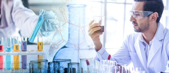 Wall Mural - attractive scientist man testing chemical sample in flask at laboratory with lab glassware backgroun