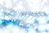 Fototapeta  - 2023 Christmas new year winter snowflakes and Sparkling Glitter Background. Falling Shiny Confetti with Shards. Shining Light Effect for Christmas or New Year Greeting Card.