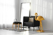 © Pixel-Shot - Comfortable armchair, mirror and golden flamingo near light wall in room interior