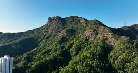 Wall Mural - Drone fly over the Lion Rock mountain