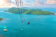 View Of Longest Cable Car Ride In The World, Phu Quoc Island, Vietnam. Below Is Seascape With Tropical Islands And Boats.
