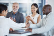© Wesley J/peopleimages.com - Handshake, b2b and welcome with team clapping, meeting and smile for deal, collaboration and teamwork at a office. Thank you, partnership and business people trust company support for goal or target