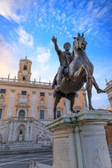 Wall Mural - The Capitoline Hill in Rome, Italy: Statue of Roman Emperor Marcus Aurelius on horseback in front of the Palazzo Senatorio.