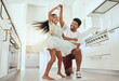 © J Maas/peopleimages.com - Love, dancing and father with girl in kitchen bonding, having fun and playing together. Family, affection and happiness in Indian dad with child dance, spin and relax in family home enjoying weekend